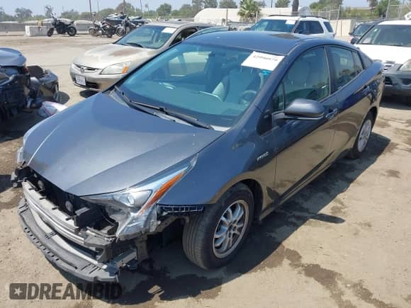 2016 Toyota Prius Two with VIN JTDKBRFUXG3020413, listed as a IAAI auction lot 42990979 with 102,663 mi miles and . Bid and sale history available at DreamBid. Image 20.