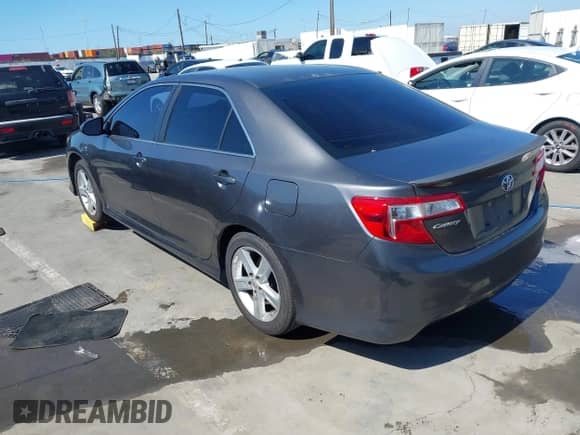 2014 Toyota Camry L with VIN 4T1BF1FK8EU380383, listed as a IAAI auction lot 43399931 with 214,853 mi miles and . Bid and sale history available at DreamBid. Image 3.