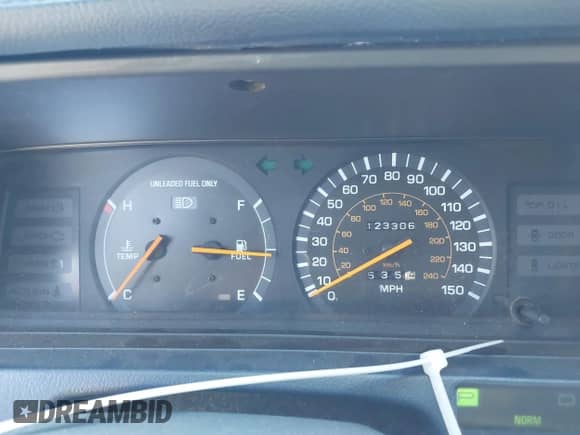 1991 Toyota Camry z VIN 4T1VV21E8MU047512, wystawiony jako IAAI lot #42854666 z przebiegiem 123 306 mil mil oraz . Historia ofert i sprzedaży dostępna na DreamBid. Obrazek 7.