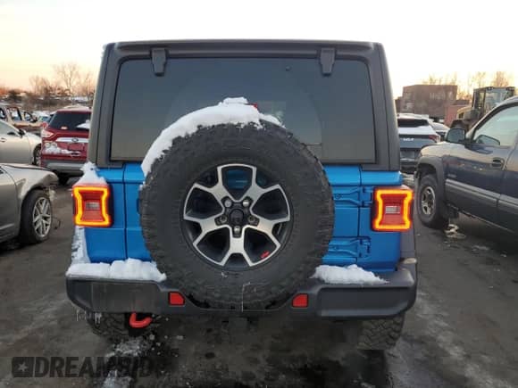2022 Jeep Wrangler Unlimited Rubicon with VIN 1C4HJXFG4NW125164, listed as a Copart auction lot 89397015 with 39,322 mi miles and Salvage title. Bid and sale history available at DreamBid. Image 6.