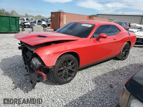 2021 Dodge Challenger SXT with VIN 2C3CDZAG9MH646189, listed as a Copart auction lot 84974085 with 87,424 mi miles and Salvage title. Bid and sale history available at DreamBid. Image 1.