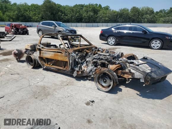 1973 Chevrolet Corvette с VIN 1Z37J3S417104, выставлен на аукционе Copart как лот 67416635 с пробегом Не указан миль и На запчасти • Non repairable. История ставок и продаж доступна на DreamBid. Изображение 4.