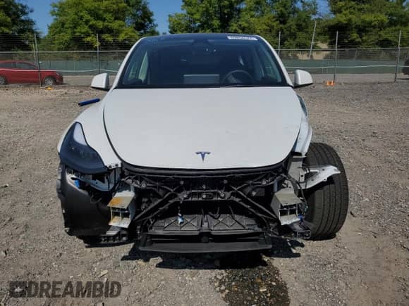 2023 Tesla Model Y Long Range с VIN 7SAYGDEE4PF596884, выставлен на аукционе Copart как лот 69856524 с пробегом 22 765 миль миль и Списание • Salvage title. История ставок и продаж доступна на DreamBid. Изображение 5.