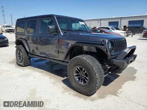 2024 Jeep Wrangler Willys with VIN 1C4RJXDG9RW286042, listed as a Copart auction lot 49459025 with 6,417 mi miles and Salvage title. Bid and sale history available at DreamBid. Image 4.
