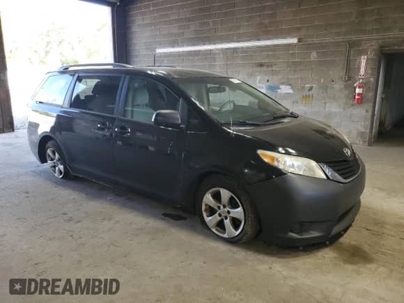 2011 Toyota Sienna LE с VIN 5TDKK3DC7BS010324, выставлен на аукционе Copart как лот 80947105 с пробегом 190 567 миль миль и Списание • Salvage title. История ставок и продаж доступна на DreamBid. Изображение 4.