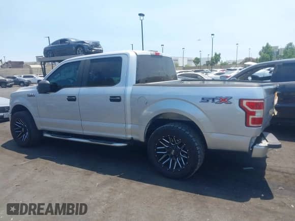 2018 Ford F-150 XL with VIN 1FTEW1CP1JKD34689, listed as a IAAI auction lot 42899519 with 127,980 mi miles and . Bid and sale history available at DreamBid. Image 15.