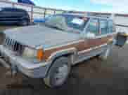 1993 Jeep Grand Cherokee with VIN 1J4GZ88Y6PC546060, listed as a IAAI auction lot 43324900 with 142,127 mi miles and . Bid and sale history available at DreamBid. Image 2.