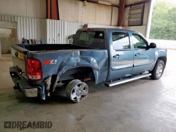 2011 GMC Sierra 1500 SLT z VIN 3GTP2WE34BG161870, wystawiony jako Copart lot #69663045 z przebiegiem 115 035 mil mil oraz Szkoda całkowita • Salvage title. Historia ofert i sprzedaży dostępna na DreamBid. Obrazek 3.