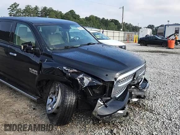 2016 Ram 1500 Laramie z VIN 1C6RR7NT5GS132458, wystawiony jako Copart lot #69504815 z przebiegiem 96 127 mil mil oraz Szkoda całkowita • Salvage title. Historia ofert i sprzedaży dostępna na DreamBid. Obrazek 13.