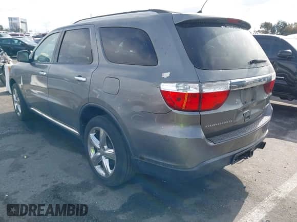 2012 Dodge Durango Citadel with VIN 1C4RDHEGXCC336158, listed as a IAAI auction lot 41408742 with 126,366 mi miles and . Bid and sale history available at DreamBid. Image 3.
