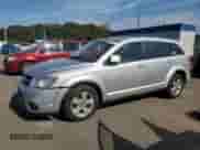 2012 Dodge Journey SXT z VIN 3C4PDDBG9CT215095, wystawiony jako Copart lot #84914405 z przebiegiem 189 885 mil mil oraz Czysty tytuł • Clean title. Historia ofert i sprzedaży dostępna na DreamBid. Obrazek 1.