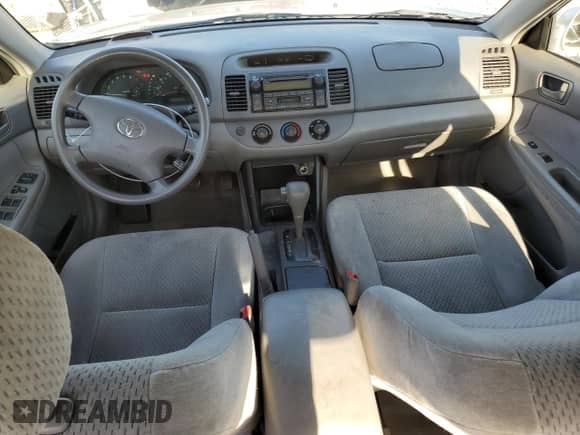 2004 Toyota Camry LE with VIN 4T1BE32K04U291054, listed as a Copart auction lot 81778925 with 164,506 mi miles and Salvage title. Bid and sale history available at DreamBid. Image 8.