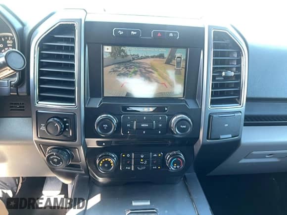 2018 Ford F-150 XL с VIN 1FTEW1E51JKE65603, выставлен на аукционе Copart как лот 89683905 с пробегом 153 623 миль миль и Чистый • Clean title. История ставок и продаж доступна на DreamBid. Изображение 13.