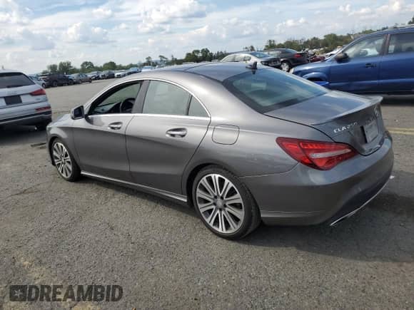 2017 Mercedes-Benz CLA 250 with VIN WDDSJ4GB6HN406289, listed as a Copart auction lot 71831385 with 184,378 mi miles and Salvage title. Bid and sale history available at DreamBid. Image 2.
