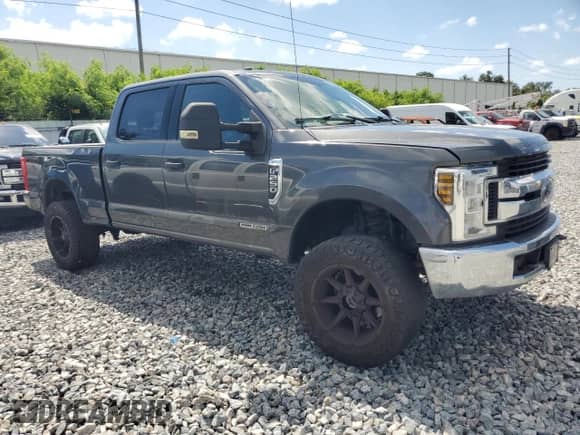 2018 Ford F-250 XL with VIN 1FT7W2BT7JEC22362, listed as a Copart auction lot 69270545 with 157,451 mi miles and Salvage title. Bid and sale history available at DreamBid. Image 4.