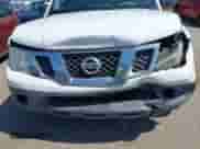 2014 Nissan Frontier S with VIN 1N6BD0CT2EN739140, listed as a IAAI auction lot 42386745 with 169,409 mi miles and . Bid and sale history available at DreamBid. Image 6.