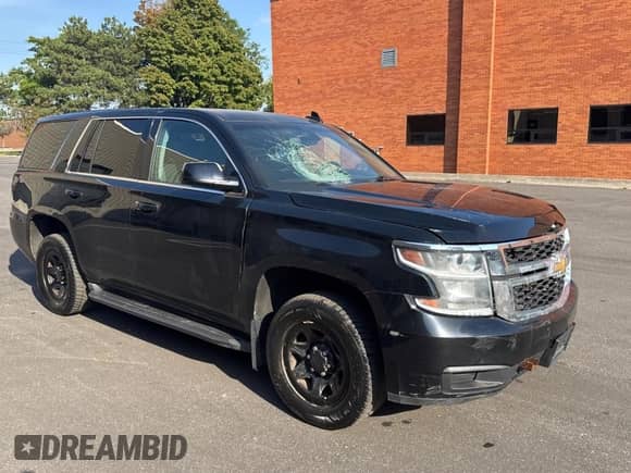 2016 Chevrolet Tahoe Commercial with VIN 1GNSKDEC0GR448085, listed as a Copart auction lot 80906745 with 277,149 mi miles and Clean title. Bid and sale history available at DreamBid. Image 1.