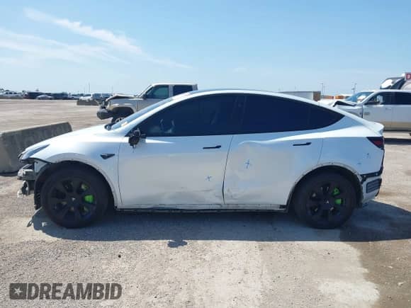 2023 Tesla Model Y Long Range z VIN 7SAYGDEE0PA178495, wystawiony jako IAAI lot #42507571 z przebiegiem 55 840 mil mil oraz . Historia ofert i sprzedaży dostępna na DreamBid. Obrazek 14.