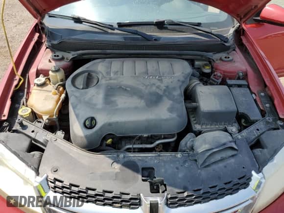 2013 Dodge Avenger SXT z VIN 1C3CDZCG5DN682059, wystawiony jako Copart lot #62111244 z przebiegiem 152 702 mil mil oraz Czysty tytuł • Clean title. Historia ofert i sprzedaży dostępna na DreamBid. Obrazek 11.