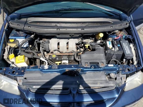 2000 Dodge Caravan SE z VIN 2B4GP45R0YR850038, wystawiony jako Copart lot #82138045 z przebiegiem 173 111 mil mil oraz Czysty tytuł • Clean title. Historia ofert i sprzedaży dostępna na DreamBid. Obrazek 12.