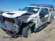 2022 Chevrolet Silverado 2500HD Work Truck z VIN 1GB1YLE78NF325329, wystawiony jako IAAI lot #41810070 z przebiegiem 34 933 mil mil oraz . Historia ofert i sprzedaży dostępna na DreamBid. Obrazek 2.