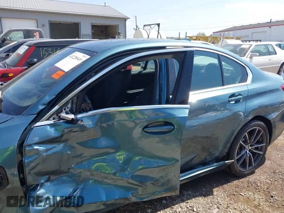 2021 BMW 3 Series 330e xDrive z VIN 3MW5P9J07M8B73432, wystawiony jako IAAI lot #43228949 z przebiegiem 37 102 mil mil oraz . Historia ofert i sprzedaży dostępna na DreamBid. Obrazek 15.