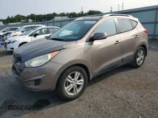 2011 Hyundai Tucson GLS with VIN KM8JU3AC6BU196861, listed as a Copart auction lot 68093865 with 165,159 mi miles and Salvage title. Bid and sale history available at DreamBid. Image 1.