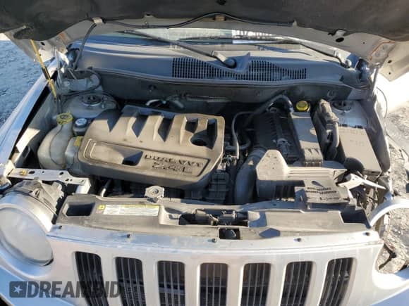 2010 Jeep Compass Sport z VIN 1J4NT1FB9AD626226, wystawiony jako Copart lot #82933784 z przebiegiem 191 772 mil mil oraz Szkoda całkowita • Salvage title. Historia ofert i sprzedaży dostępna na DreamBid. Obrazek 13.