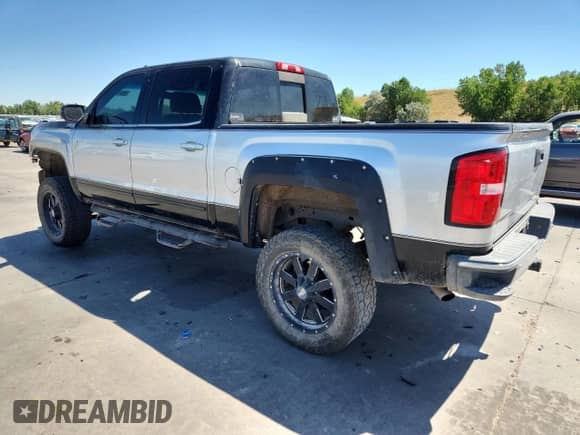 2015 GMC Sierra 1500 SLE z VIN 3GTU2UEC2FG232710, wystawiony jako Copart lot #68812915 z przebiegiem 119 685 mil mil oraz Szkoda całkowita • Salvage title. Historia ofert i sprzedaży dostępna na DreamBid. Obrazek 2.