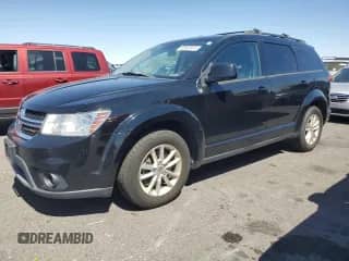 2014 Dodge Journey SXT with VIN 3C4PDDBG7ET297654, listed as a Copart auction lot 62957915 with 203,313 mi miles and Clean title. Bid and sale history available at DreamBid. Image 1.