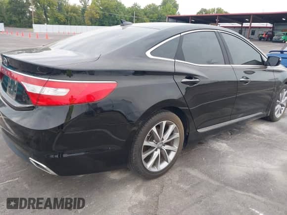 2015 Hyundai Azera z VIN KMHFG4JG6FA474283, wystawiony jako IAAI lot #43115461 z przebiegiem 101 378 mil mil oraz . Historia ofert i sprzedaży dostępna na DreamBid. Obrazek 4.