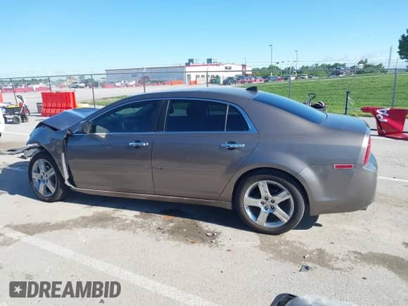 2012 Chevrolet Malibu 3LT z VIN 1G1ZF5E78CF119482, wystawiony jako IAAI lot #42305828 z przebiegiem 133 993 mil mil oraz . Historia ofert i sprzedaży dostępna na DreamBid. Obrazek 15.