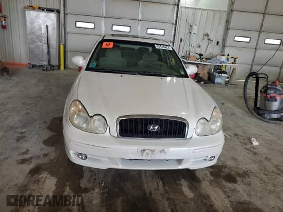 2002 Hyundai Sonata z VIN KMHWF25HX2A716609, wystawiony jako Copart lot #78454424 z przebiegiem 283 736 mil mil oraz Czysty tytuł • Clean title. Historia ofert i sprzedaży dostępna na DreamBid. Obrazek 5.