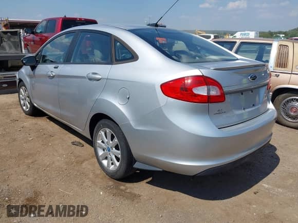 2012 Ford Fiesta SE with VIN 3FADP4BJ9CM196067, listed as a IAAI auction lot 43227887 with 139,354 mi miles and . Bid and sale history available at DreamBid. Image 3.