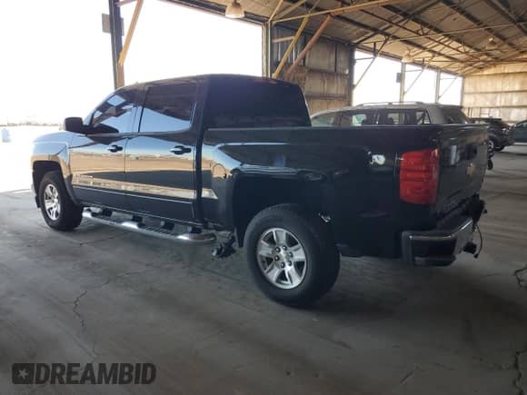 2016 Chevrolet Silverado 1500 LT with VIN 3GCPCREC2GG211381, listed as a Copart auction lot 86173335 with 86,078 mi miles and Salvage title. Bid and sale history available at DreamBid. Image 2.