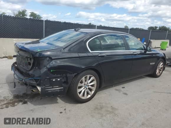 2013 BMW 7 Series 740Li xDrive with VIN WBAYF4C58DD127381, listed as a Copart auction lot 82588025 with 144,701 mi miles and Salvage title. Bid and sale history available at DreamBid. Image 3.