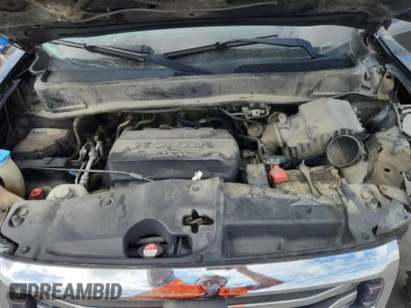 2015 Honda Pilot EX-L с VIN 5FNYF4H53FB051785, выставлен на аукционе Copart как лот 70082825 с пробегом Не указан миль и Списание • Salvage title. История ставок и продаж доступна на DreamBid. Изображение 12.