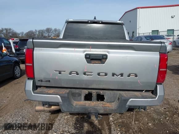 2024 Toyota Tacoma SR5 with VIN 3TYLB5JN0RT037837, listed as a IAAI auction lot 41315485 with 14,471 mi miles and . Bid and sale history available at DreamBid. Image 17.