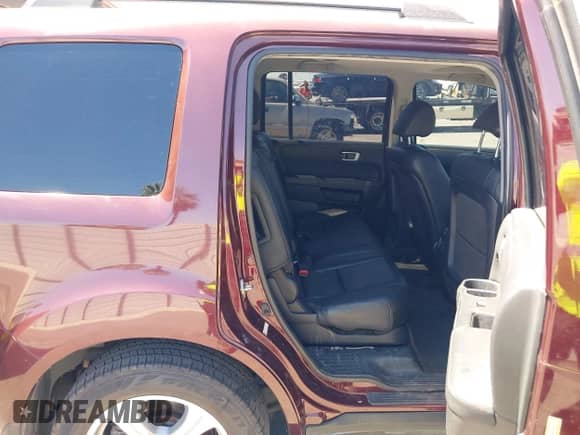 2014 Honda Pilot EX-L with VIN 5FNYF3H5XEB009008, listed as a IAAI auction lot 43024881 with 119,646 mi miles and . Bid and sale history available at DreamBid. Image 8.