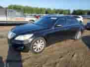 2009 Hyundai Genesis with VIN KMHGC46E09U054187, listed as a Copart auction lot 71584024 with 325,244 mi miles and Salvage title. Bid and sale history available at DreamBid. Image 1.