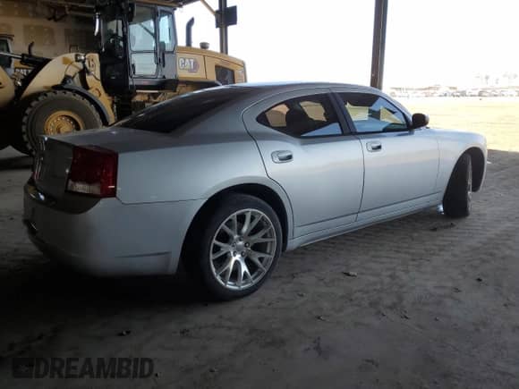 2009 Dodge Charger SE with VIN 2B3KA43D39H505990, listed as a Copart auction lot 71044214 with 223,573 mi miles and Salvage title. Bid and sale history available at DreamBid. Image 3.