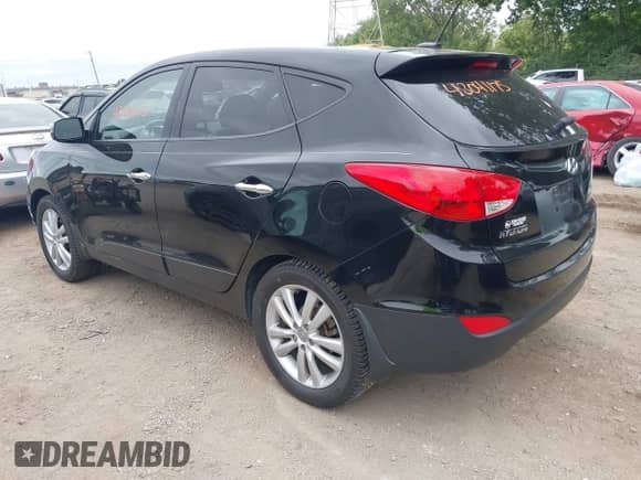 2012 Hyundai Tucson GLS with VIN KM8JU3ACXCU519889, listed as a IAAI auction lot 43041175 with 157,398 mi miles and . Bid and sale history available at DreamBid. Image 3.
