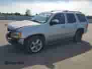 2011 Chevrolet Tahoe LS with VIN 1GNSCAE03BR211696, listed as a Copart auction lot 81493645 with 124,341 mi miles and Salvage title. Bid and sale history available at DreamBid. Image 1.