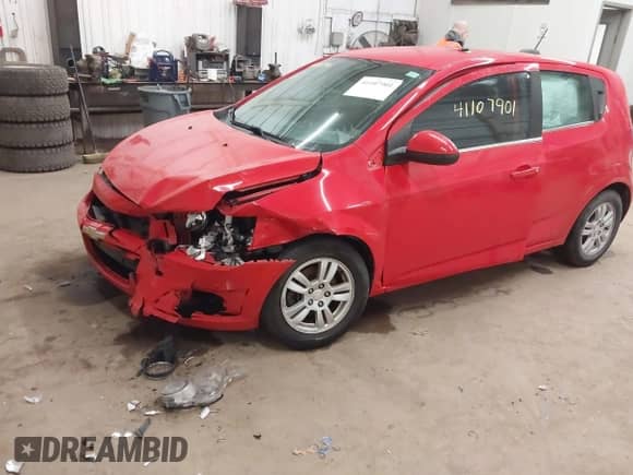 2015 Chevrolet Sonic LT with VIN 1G1JC6SH7F4148478, listed as a IAAI auction lot 41107901 with 64,029 mi miles and . Bid and sale history available at DreamBid. Image 6.