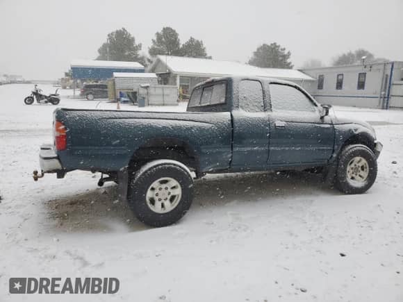 1997 Toyota Tacoma z VIN 4TAWM72N2VZ315302, wystawiony jako Copart lot #87952085 z przebiegiem 190 437 mil mil oraz Szkoda całkowita • Salvage title. Historia ofert i sprzedaży dostępna na DreamBid. Obrazek 3.