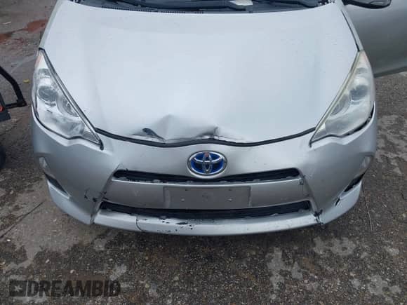 2014 Toyota Prius One z VIN JTDKDTB31E1059131, wystawiony jako IAAI lot #42999949 z przebiegiem 185 962 mil mil oraz . Historia ofert i sprzedaży dostępna na DreamBid. Obrazek 6.