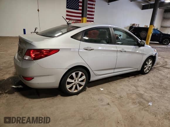2014 Hyundai Accent GLS z VIN KMHCU4AE1EU588814, wystawiony jako Copart lot #80934265 z przebiegiem Nie podano mil oraz Szkoda całkowita • Salvage title. Historia ofert i sprzedaży dostępna na DreamBid. Obrazek 3.