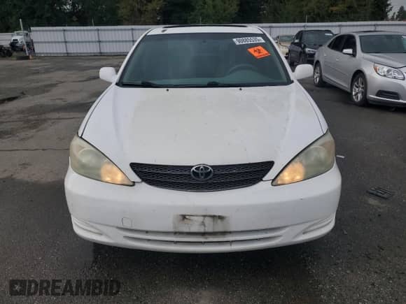 2004 Toyota Camry LE z VIN JTDBE32K340268167, wystawiony jako Copart lot #90885535 z przebiegiem 159 808 mil mil oraz Czysty tytuł • Clean title. Historia ofert i sprzedaży dostępna na DreamBid. Obrazek 5.
