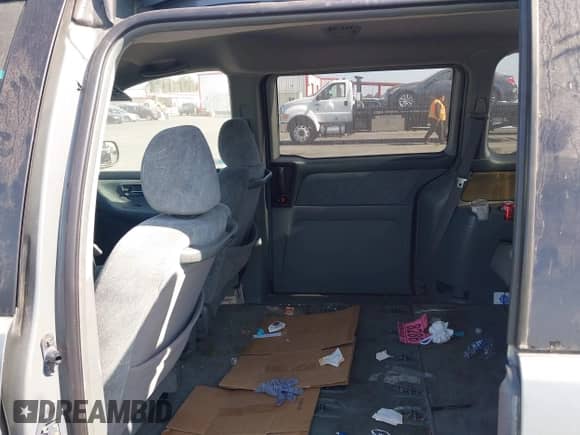 2000 Honda Odyssey EX with VIN 2HKRL186XYH593393, listed as a IAAI auction lot 42877242 with 164,593 mi miles and . Bid and sale history available at DreamBid. Image 8.