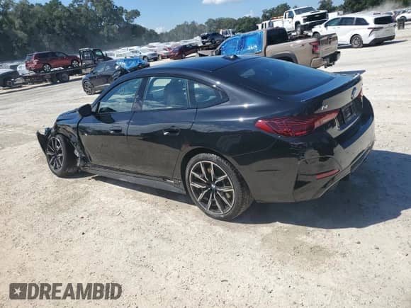 2025 BMW i4 eDrive40 с VIN WBY23HD01SFT95362, выставлен на аукционе Copart как лот 81665085 с пробегом 7 885 миль миль и На запчасти • Non repairable. История ставок и продаж доступна на DreamBid. Изображение 2.